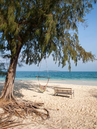 bench on sand beachの写真素材