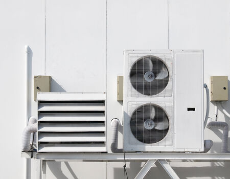Air conditioning condensor and pipe line on the wall