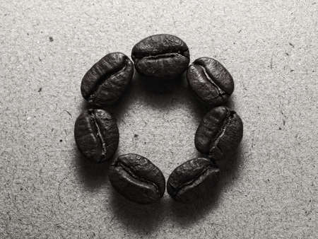 Roasted Coffee Beans on paper texture,vintage monotone color background