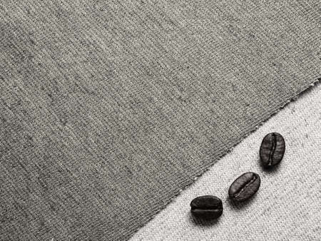 Roasted Coffee Beans on fabric textile, monotone color