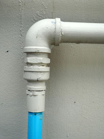 Galvanized steel pipe with tee, elbow, fitting and valve, water piping systemの写真素材