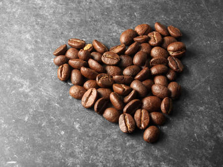 Roasted coffee beans, heart formの写真素材