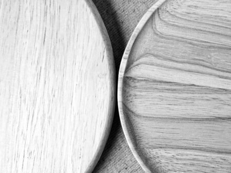 Wood plate on fabric, monotone color backgroundの写真素材