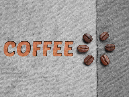 Roasted Coffee Beans on fabric textileの写真素材