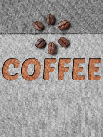 Roasted Coffee Beans on fabric textileの写真素材