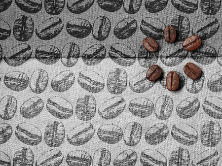 Roasted Coffee Beans on fabric textileの写真素材