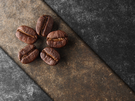 Coffee crop beans on wood, coffe texture backgroundの写真素材