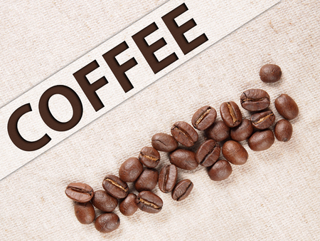 coffee crop beans on fabric textile texture backgroundの写真素材