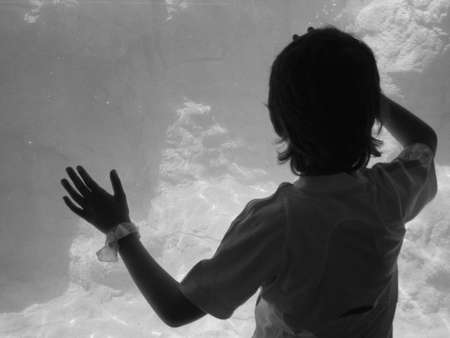 Black and white image of a child.の写真素材