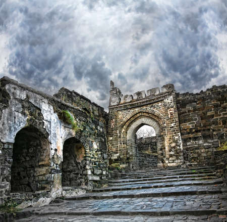 Ancient Daulatabad fort with dramatic sky in Aurangabad, Maharashtra, Indiaの写真素材