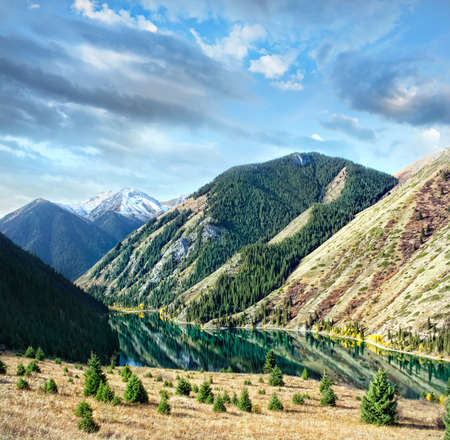 Mountain lake Kolsai in autumn in Kazakhstan, central Asiaの写真素材