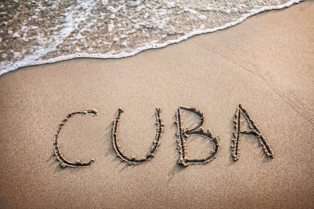 Cuba title on the sand beach near the oceanの写真素材