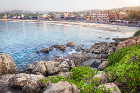 KOVALAM, KERALA, INDIA - JANUARY 29  View to the Lighthouse beach with tourists, restaurants and hotels のeditorial素材
