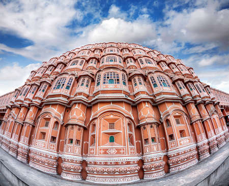 Hawa Mahal facade with many windows and balconies at blue sky in Jaipur Rajasthan, Indiaのeditorial素材