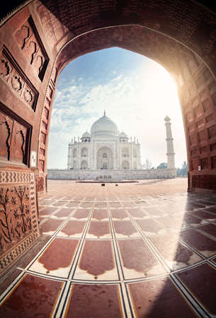 Taj Mahal view from the mosque through the arch in Agra, Uttar Pradesh, Indiaの写真素材