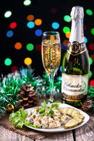 MOSCOW, RUSSIA â December 31, 2014: Soviet Union traditional champagne and Olivie salad at New Year eveのeditorial素材