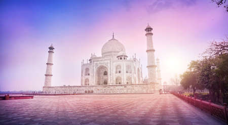 Taj Mahal tomb in the purple foggy morning in Agra, Uttar Pradesh, Indiaの写真素材