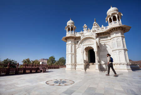 JODHPUR, RAJASTHAN, INDIA - MARCH 09, 2015: Foreign tourist walking near Royal Cenotaph memorial from white marble â one of the famous place in Jodhpurのeditorial素材