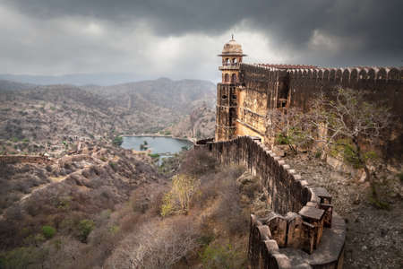 Jaigarh fort tower and high wall on the hill at overcast sky in Jaipur, Rajasthan, Indiaのeditorial素材