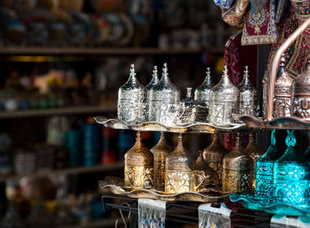 Copper and silver Turkish coffee sets at Istanbul marketの写真素材