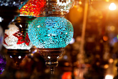 Colorful bright lamps hanging at the shop of Grand Bazaar in Istanbul, Turkeyの写真素材