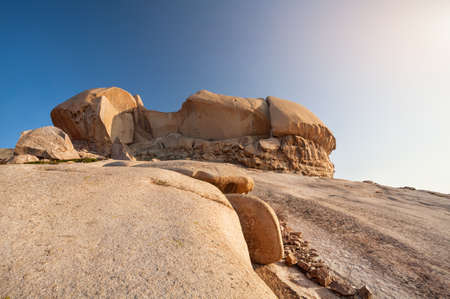 Extinct volcano Bektau Ata in the desert at beautidul sunset of eastern Kazakhstanの写真素材
