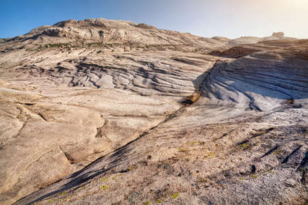 Extinct volcano Bektau Ata in the desert at beautidul sunset of eastern Kazakhstanの写真素材