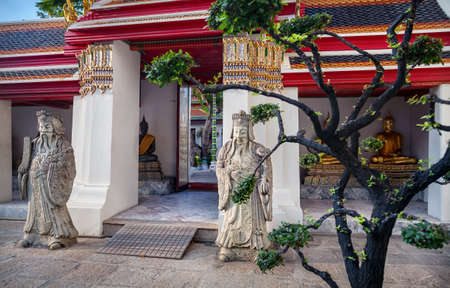 Stone statues in Buddhist Temple Wat Pho in Bangkok, Thailandの写真素材