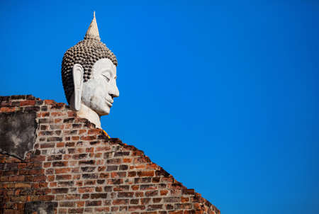 Big Buddha statue in Wat Yai Chai Mongkol monastery at blue sky in Ayuttaya, Thailandの写真素材