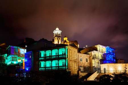Narikala fortress and Public Sulfuric bath with colorful lighting at night in central Tbilisi, Georgiaのeditorial素材