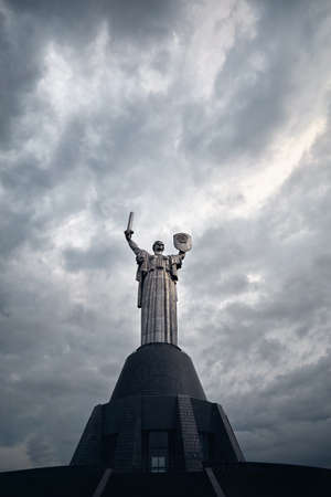 Mother Motherland statue at grey cloudy sky background in Kiev, Ukraineのeditorial素材