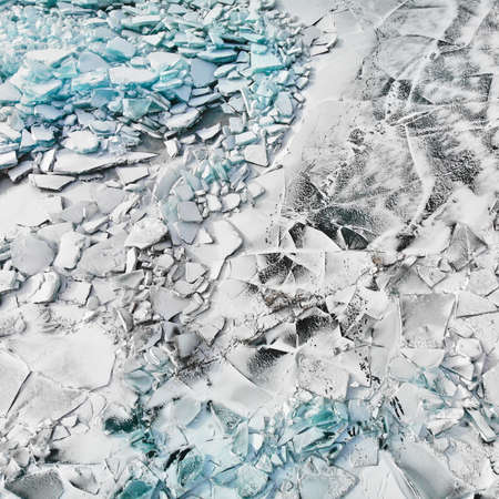 Top view of Ice hummock and cracks at frozen lake Baikal, Russiaの写真素材