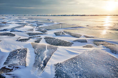 Beautiful landscape of Ice hummock and cracks at frozen lake Baikal, Russia