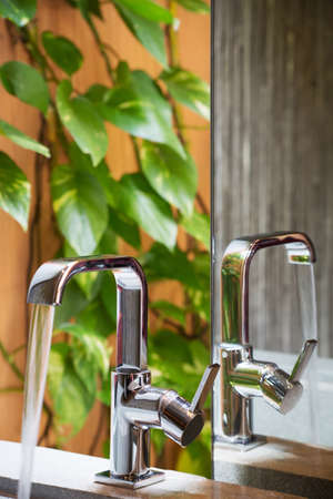 Tap with flowing waterの写真素材