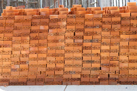 A stack of red clay bricksの写真素材