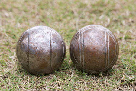 Petanque balls on the groundの写真素材