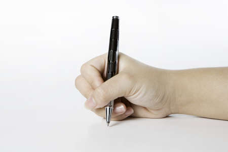 Close up of human hand with penの写真素材