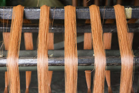 Red strings on textile machine