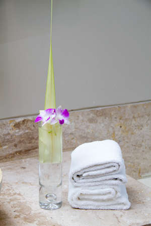Stacked white spa towelsの写真素材