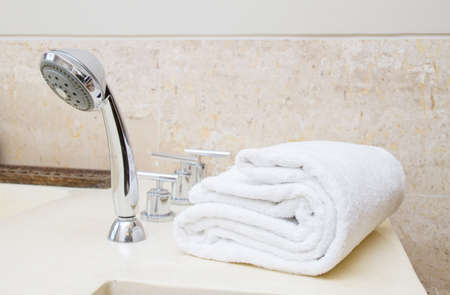 Stacked white spa towelsの写真素材