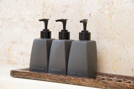Shower gel, shampoo  and conditioner bottlesの写真素材
