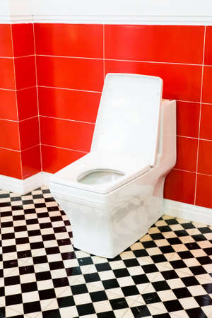 White toilet bowl in a bathroomの写真素材