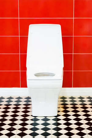 White toilet bowl in a bathroomの写真素材