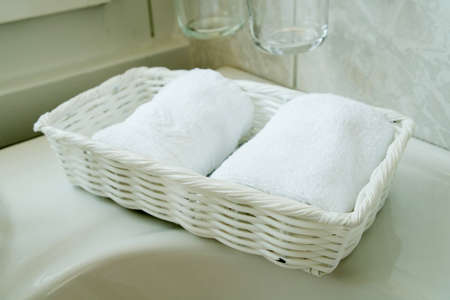 Stacked white spa towelsの写真素材