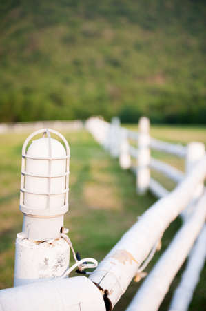 White wooden fence in the farmの写真素材