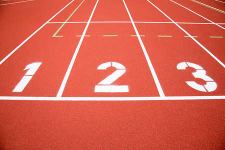 Running track numbers one two three in stadiumの写真素材