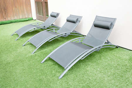 A row of stylish deck chairs