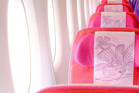 seat rows in an airplane cabinの写真素材