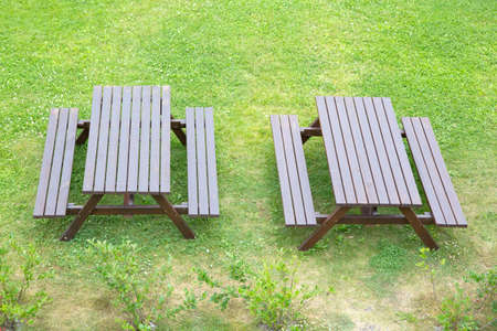 table and chairs on green yardの写真素材