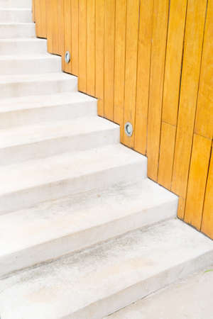 Cement stairs with wooden backgroundの写真素材